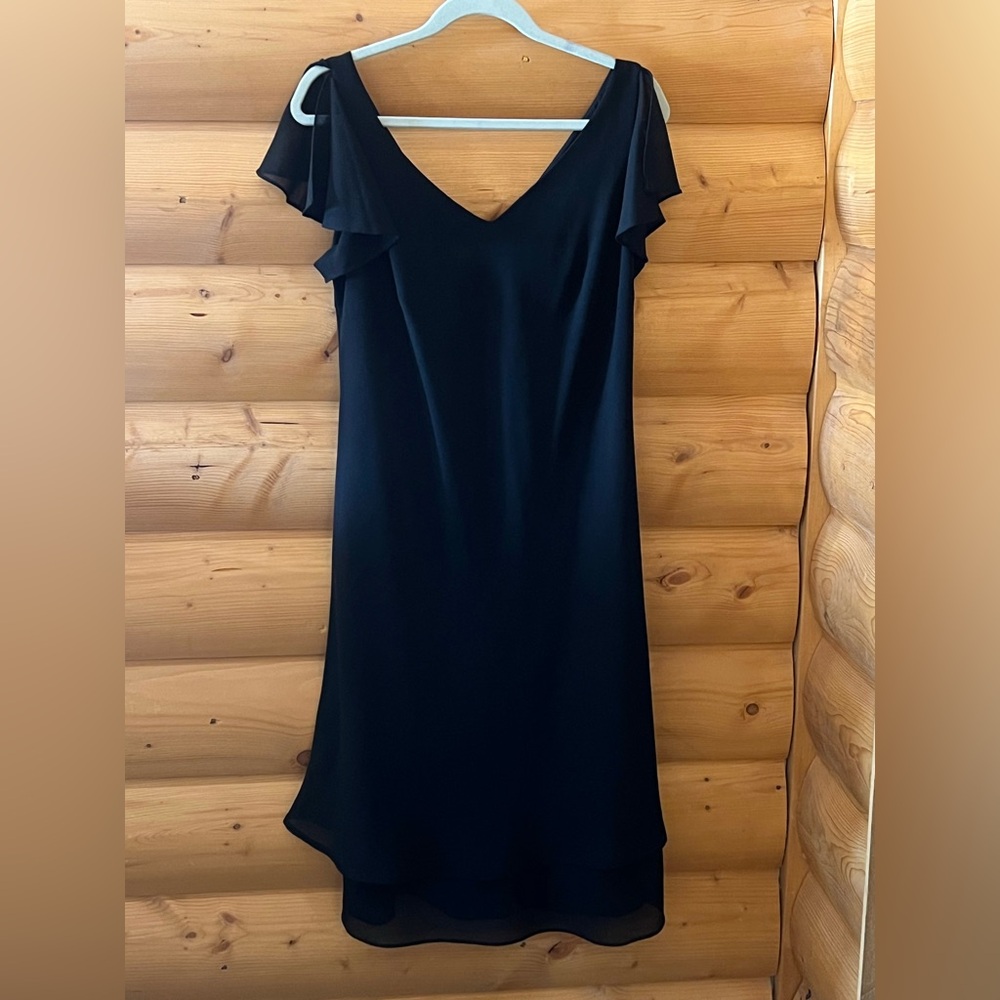 Size 16 Jessica little black dress with elegant sleeve detail.